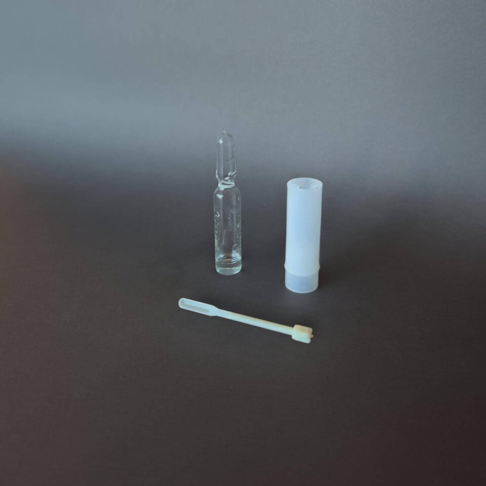 One MDMA test vile for methamphetamine, plastic cover and spatula